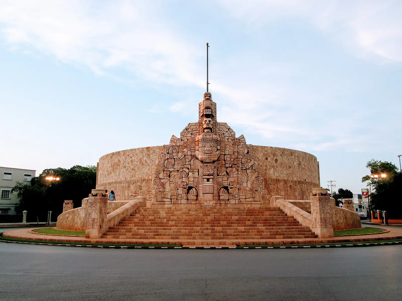 Carved stone Monumento a la Patria on Paseo de Montejo in Merida with its stepped base and flagpole