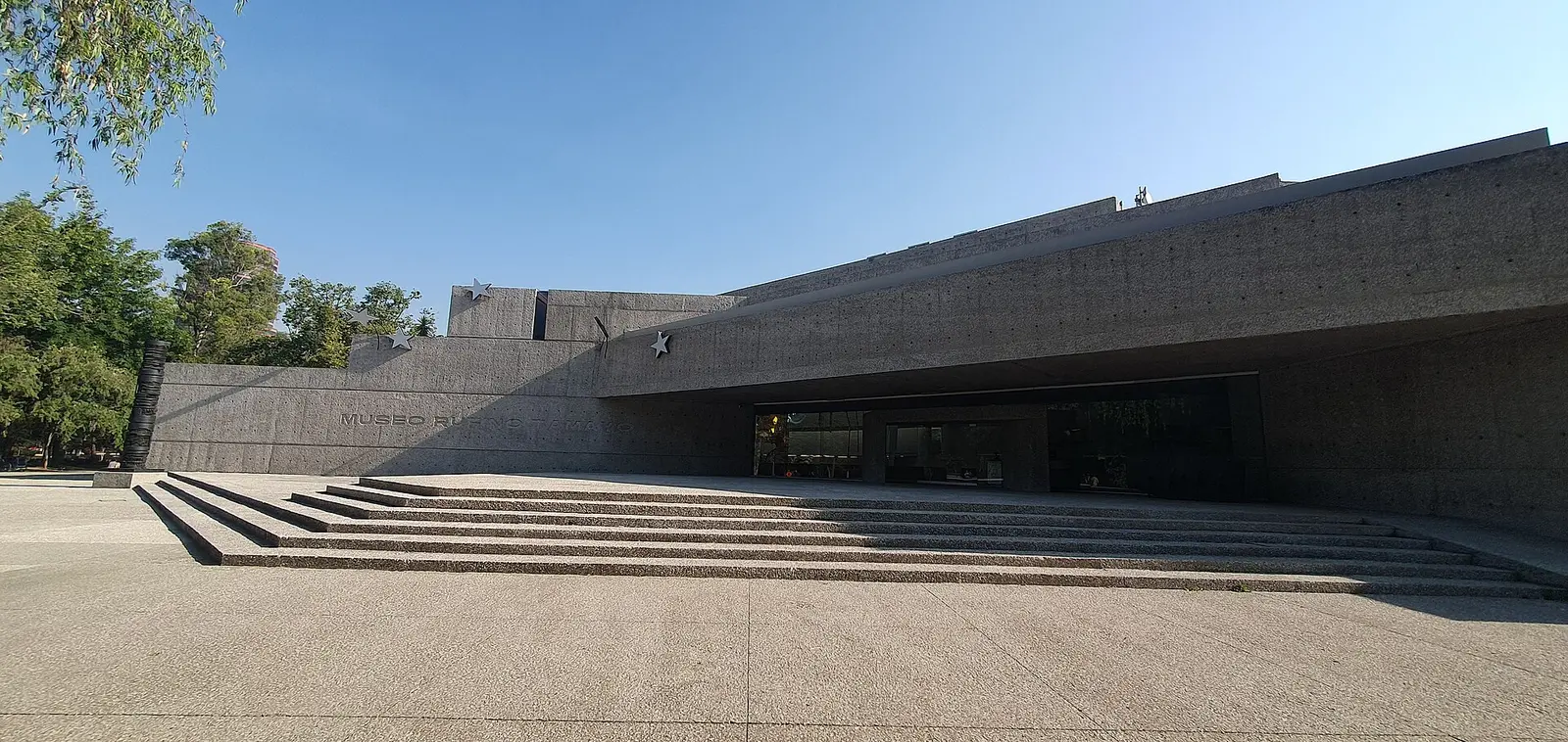 Concrete facade and broad steps of the Museo Tamayo in Chapultepec, Mexico City
