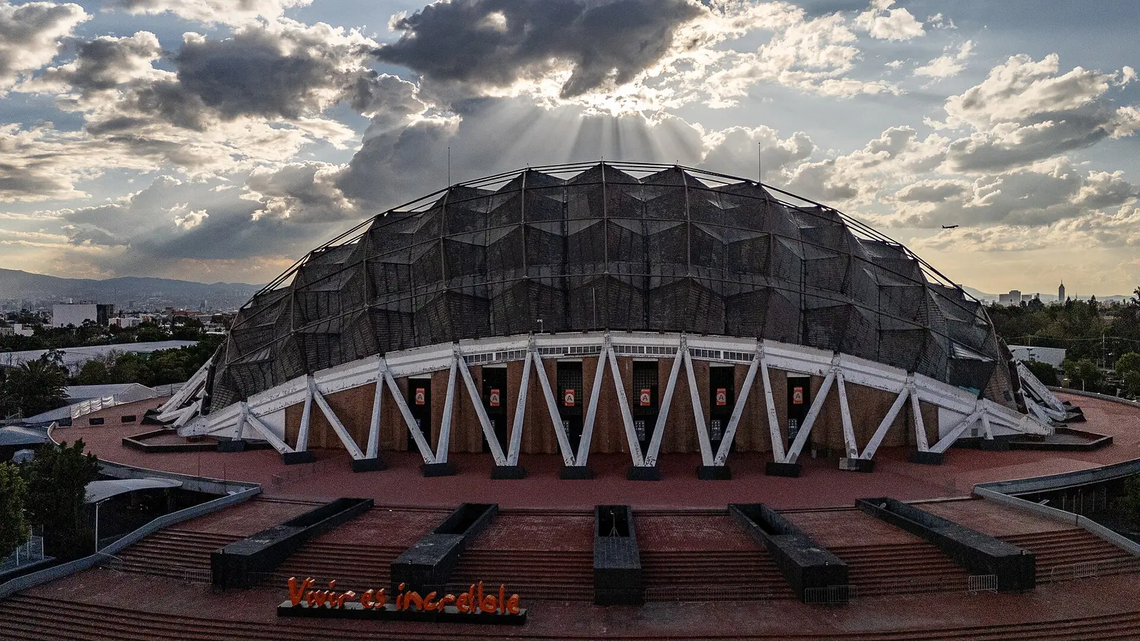 Domed roof of the Palacio de los Deportes in Mexico City at sunset