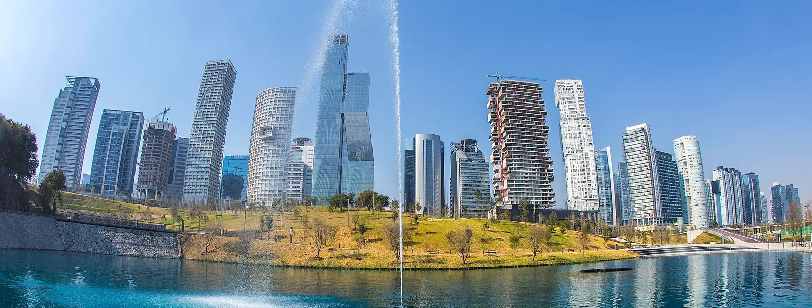 Skyscrapers of the Santa Fe district around a lake in Mexico City